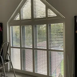 side facing shutter window 