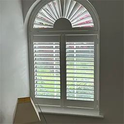 oval and square shutter window