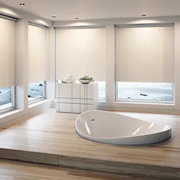 a large white bath tub sitting in a bathroom next to a window