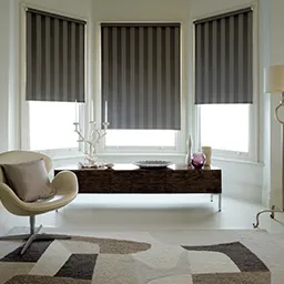 a living room with a couch and a chair